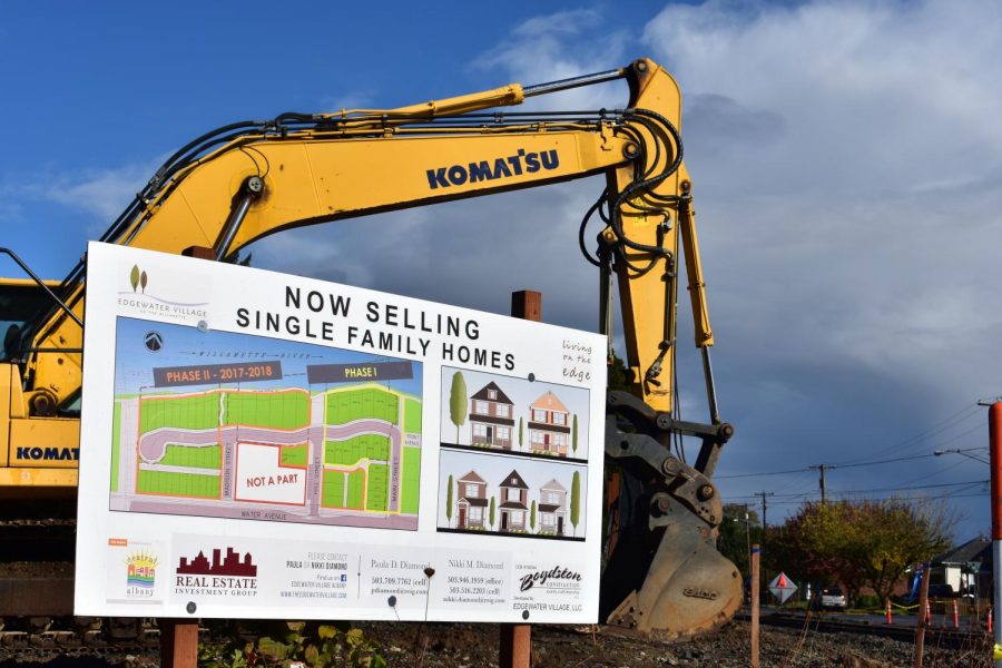 GROWTH Workers have broken ground on construction of a new housing development on Water ST. With the projected growth in population, Albany can expect more projects like these to appear around town.
