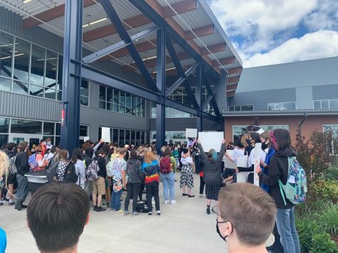 Over 200 students gather outside the entrance of West Albany during thier 8th period class to protest the schedule change