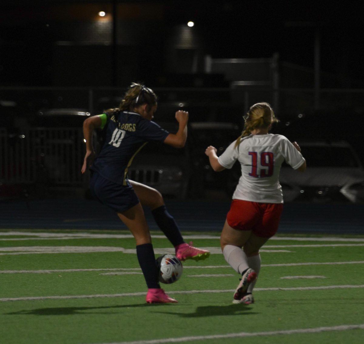 Senior team captain Emalie Lindberg keeping the ball away from Lebanon’s defense.