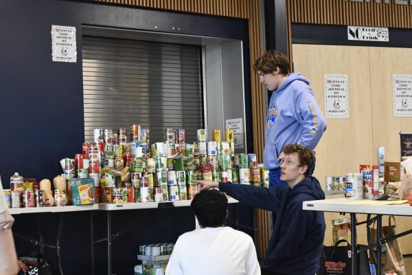 West Albanys 2023 food drive featuring Cameron Washburn, Jakob Ylen, and Jake Ly