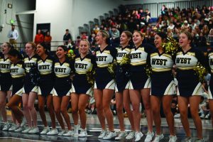 VARSITY CHEER TEAM PERFORMS “TRUCKING” CHANT AT THE PEP ASSEMBILY ON OCT. 31.
MANY OF THESE MEMBERS WOULD GO TO VEGAS AND PLACE SECOND IN THE NATIONAL
COMPETITION.