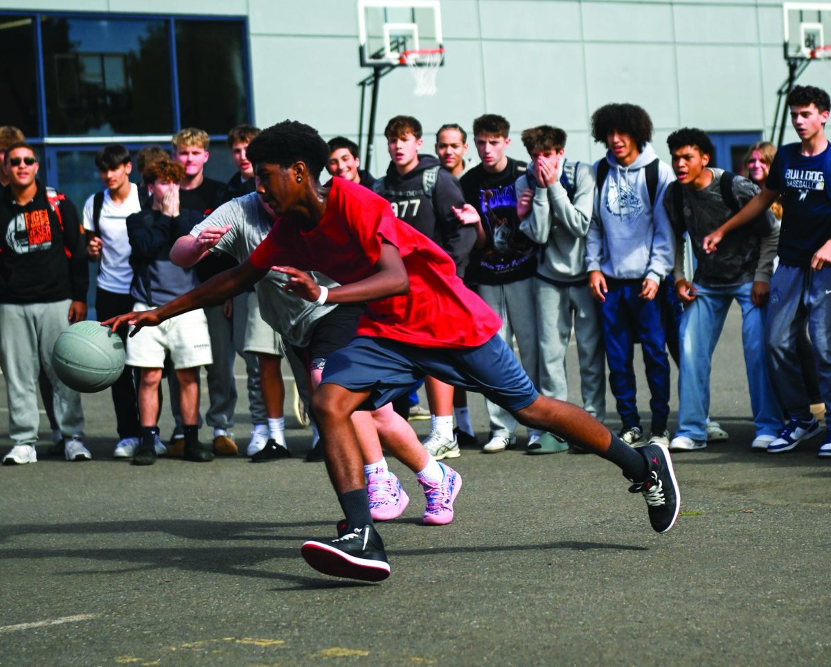 Michael Grant chases after the ball after a failed shot.